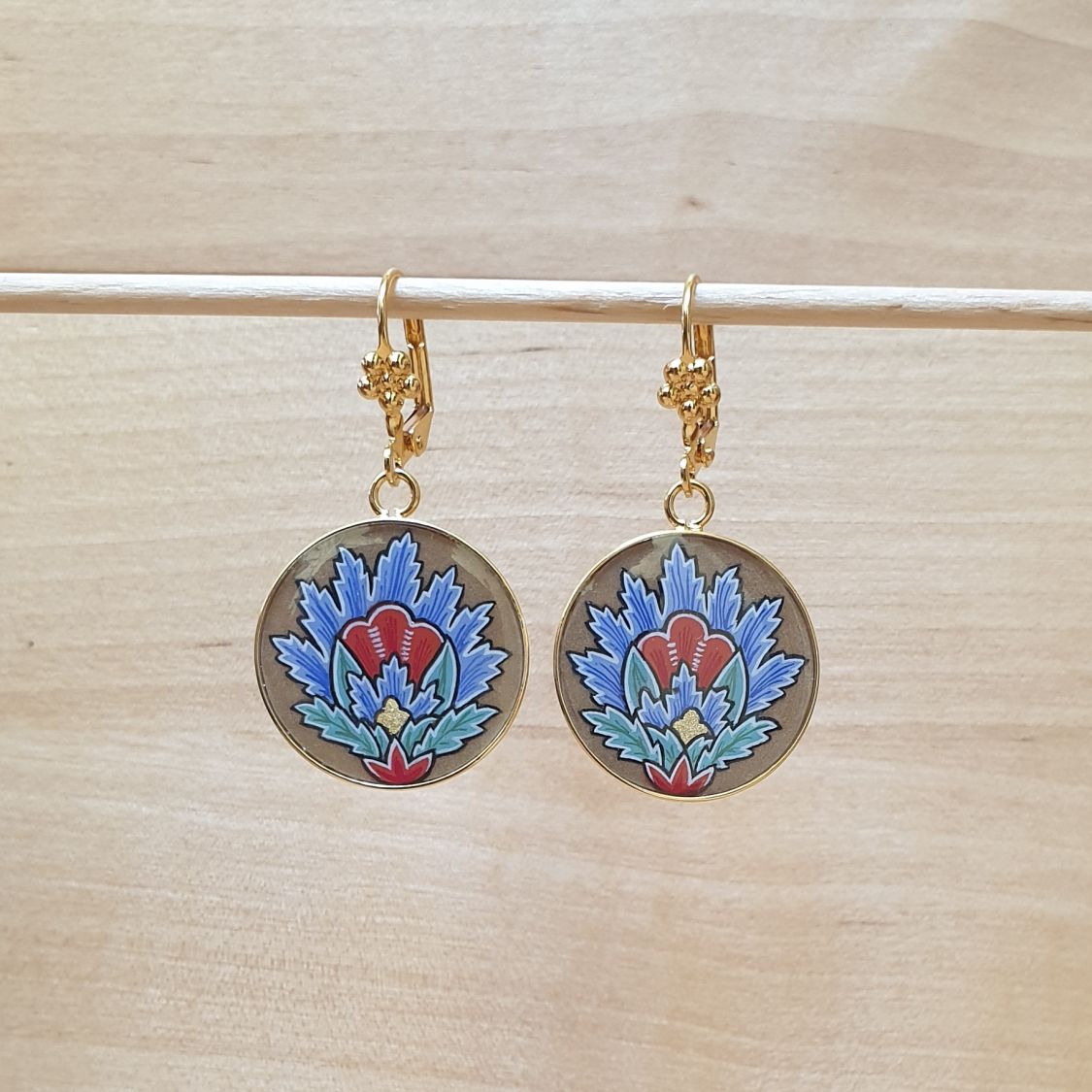 Blue oriental flower pendant earrings