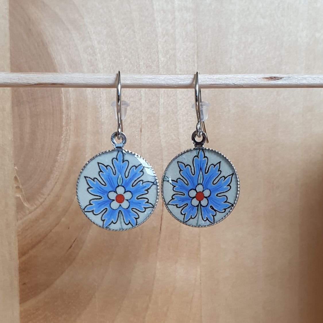 Blue oriental flower pendant earrings