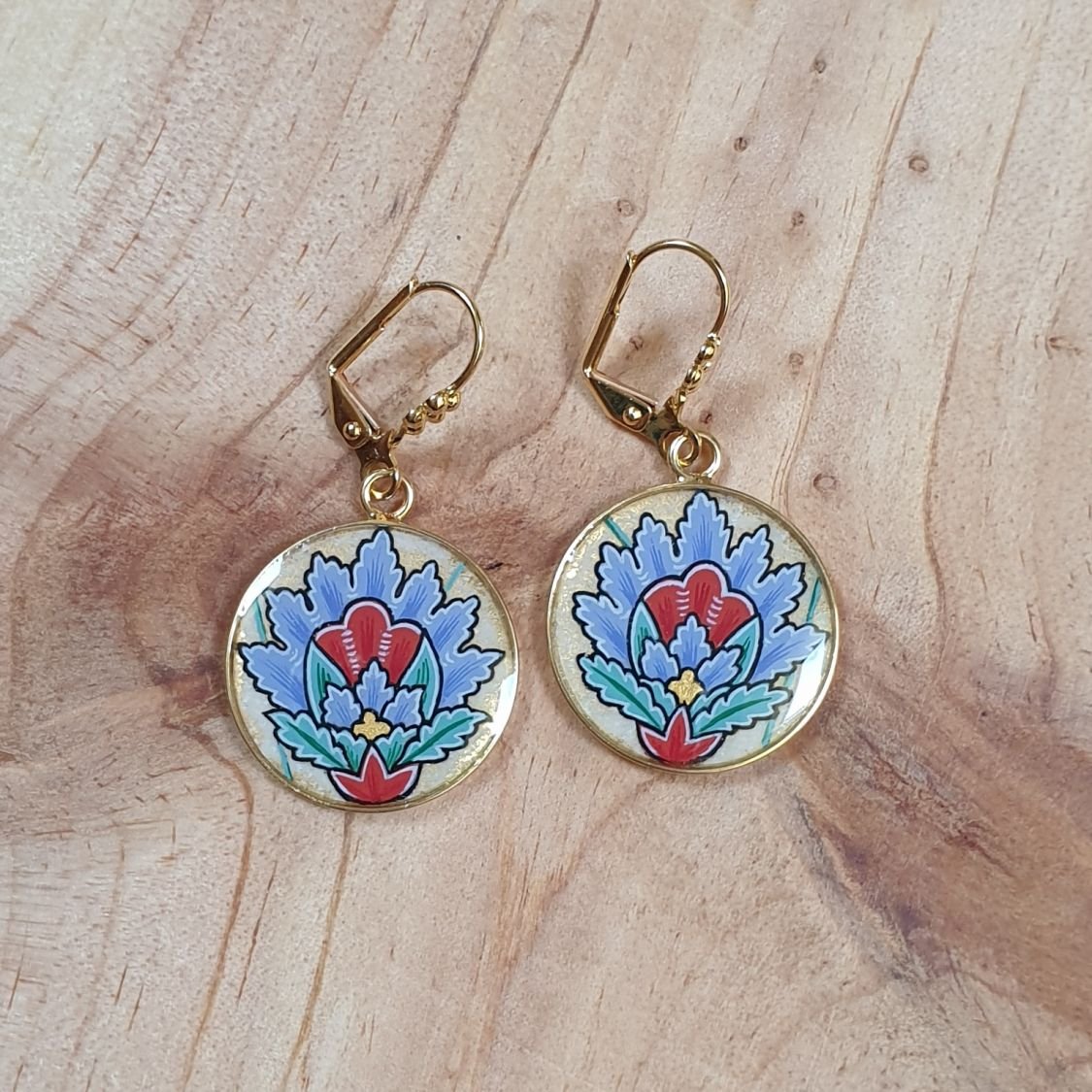 Blue oriental flower pendant earrings