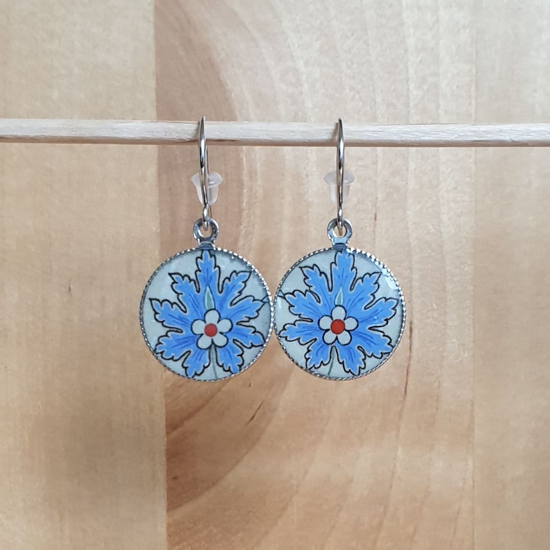 Blue oriental flower pendant earrings