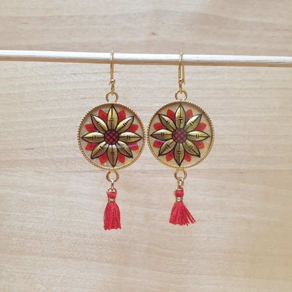 Gold/blue flower pendant earrings