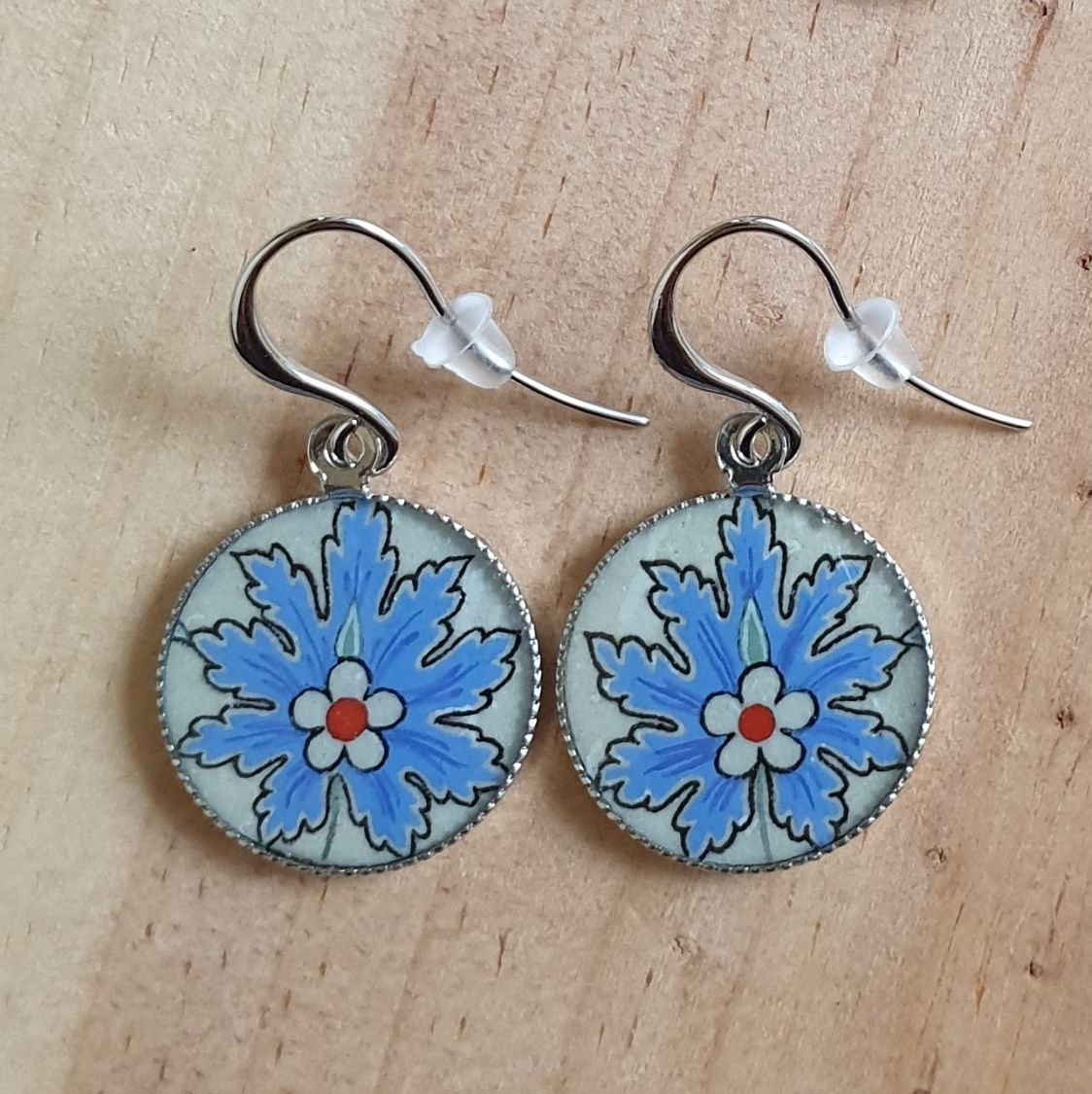 Blue oriental flower pendant earrings