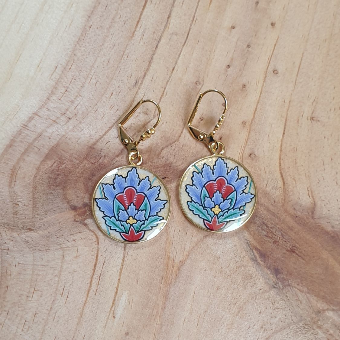 Blue oriental flower pendant earrings