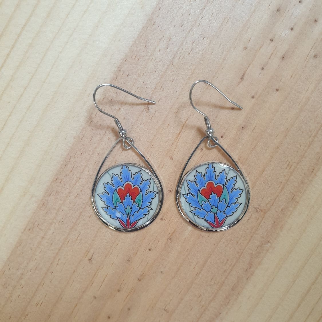 Blue oriental flower pendant earrings