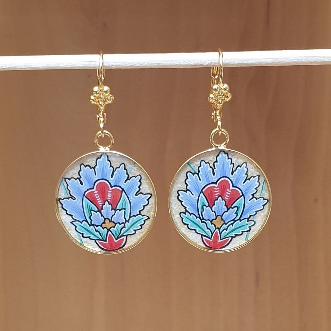 Blue oriental flower pendant earrings