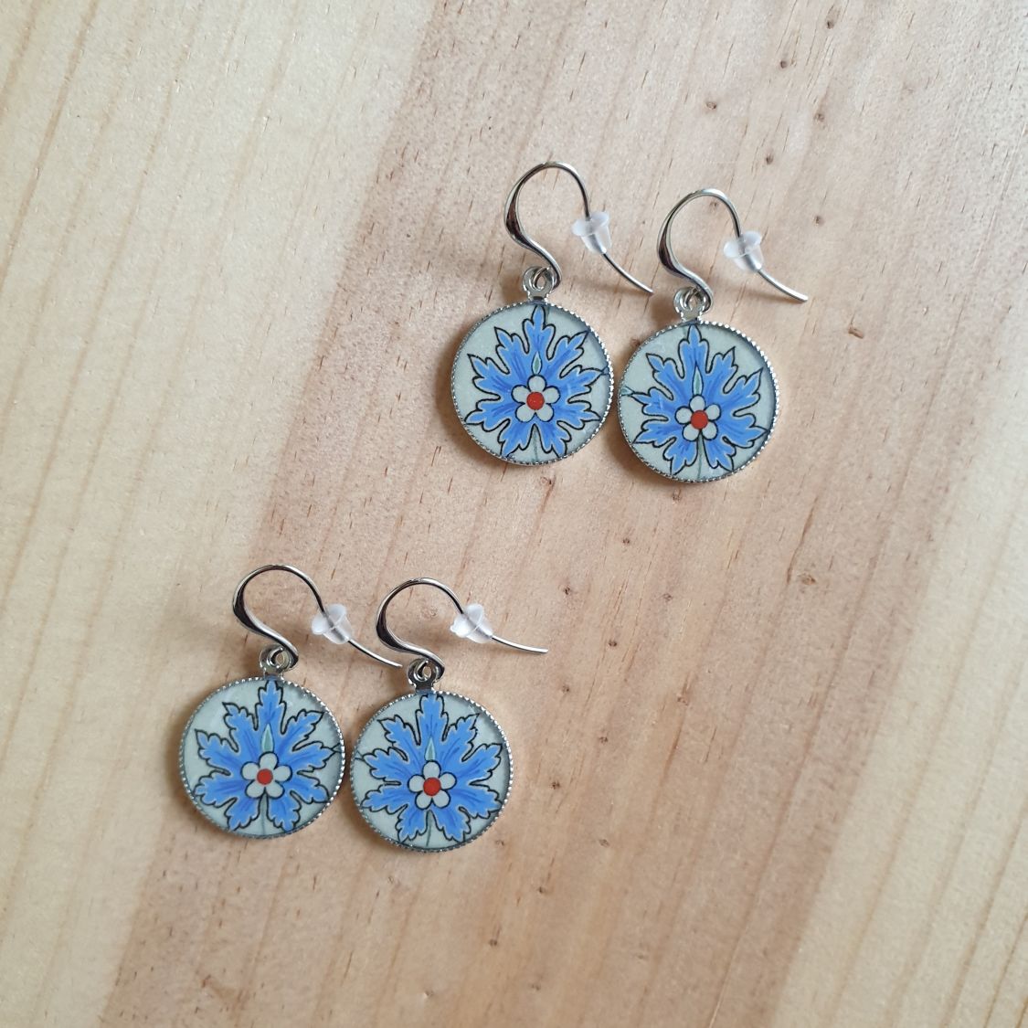 Blue oriental flower pendant earrings