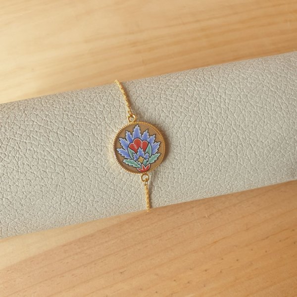 Bracelet r&eacute;glable enluminure fleur orientale bleue
