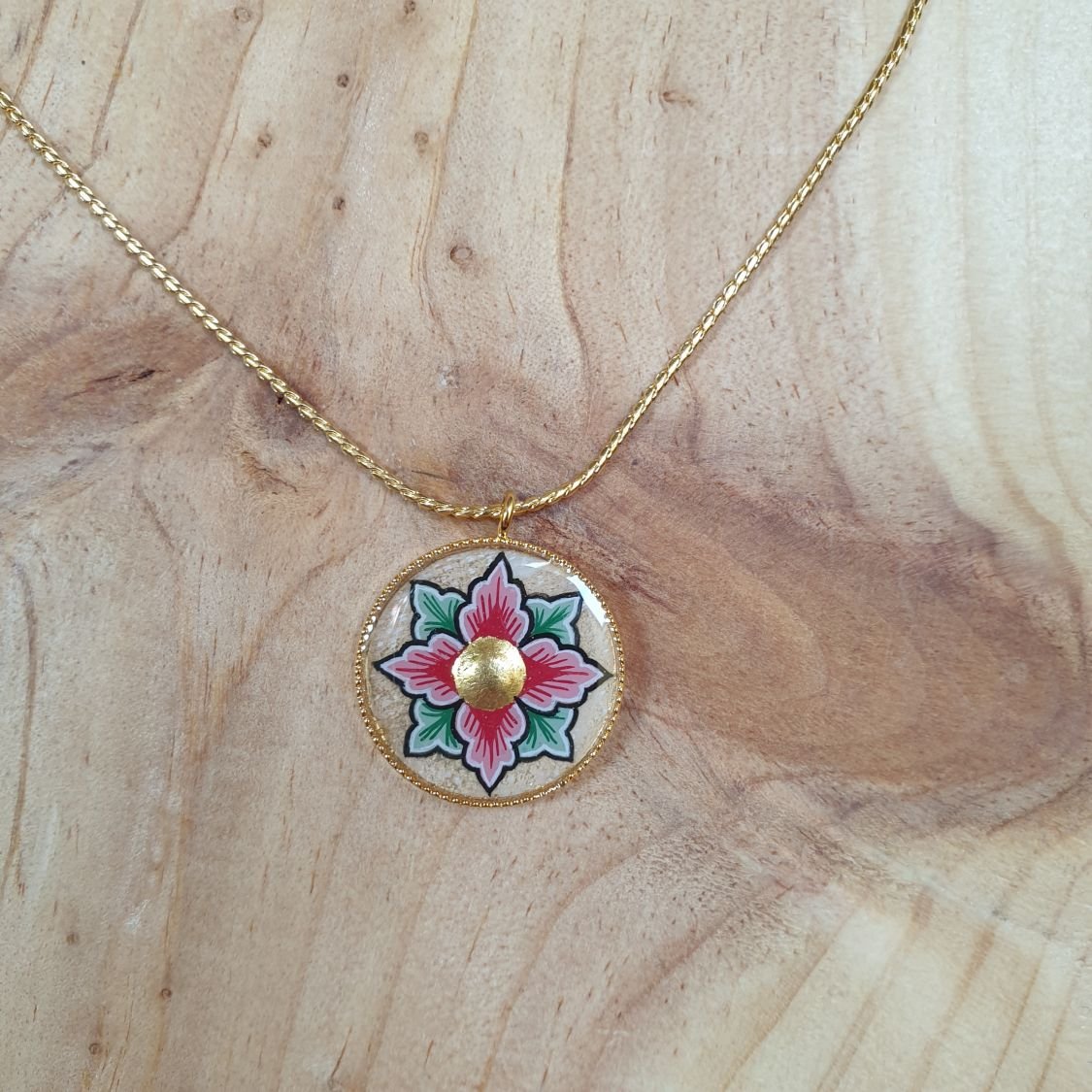 Necklace with pink or blue flowers on gold chain