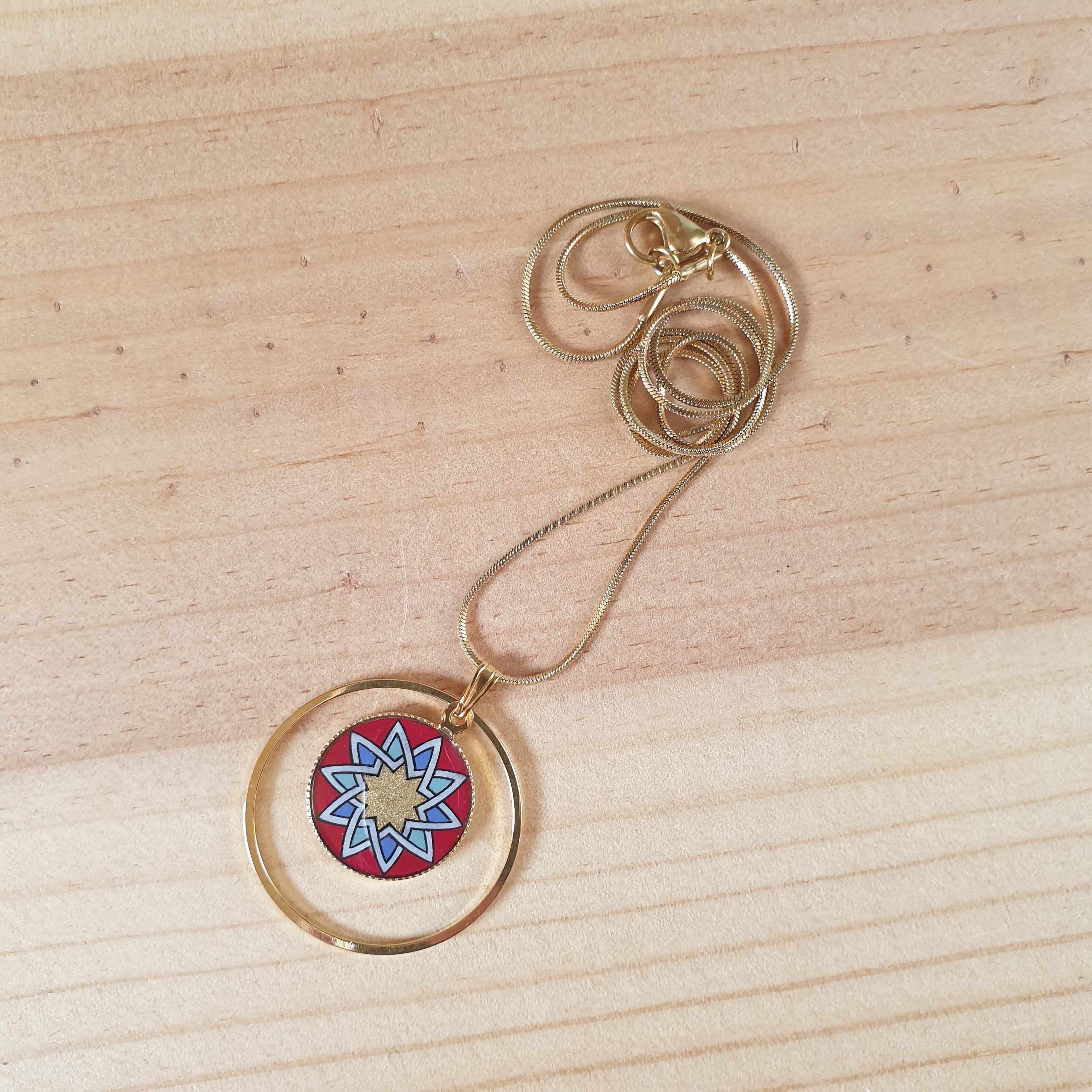 Gold/red/blue/green rosette pendant necklace on gold chain
