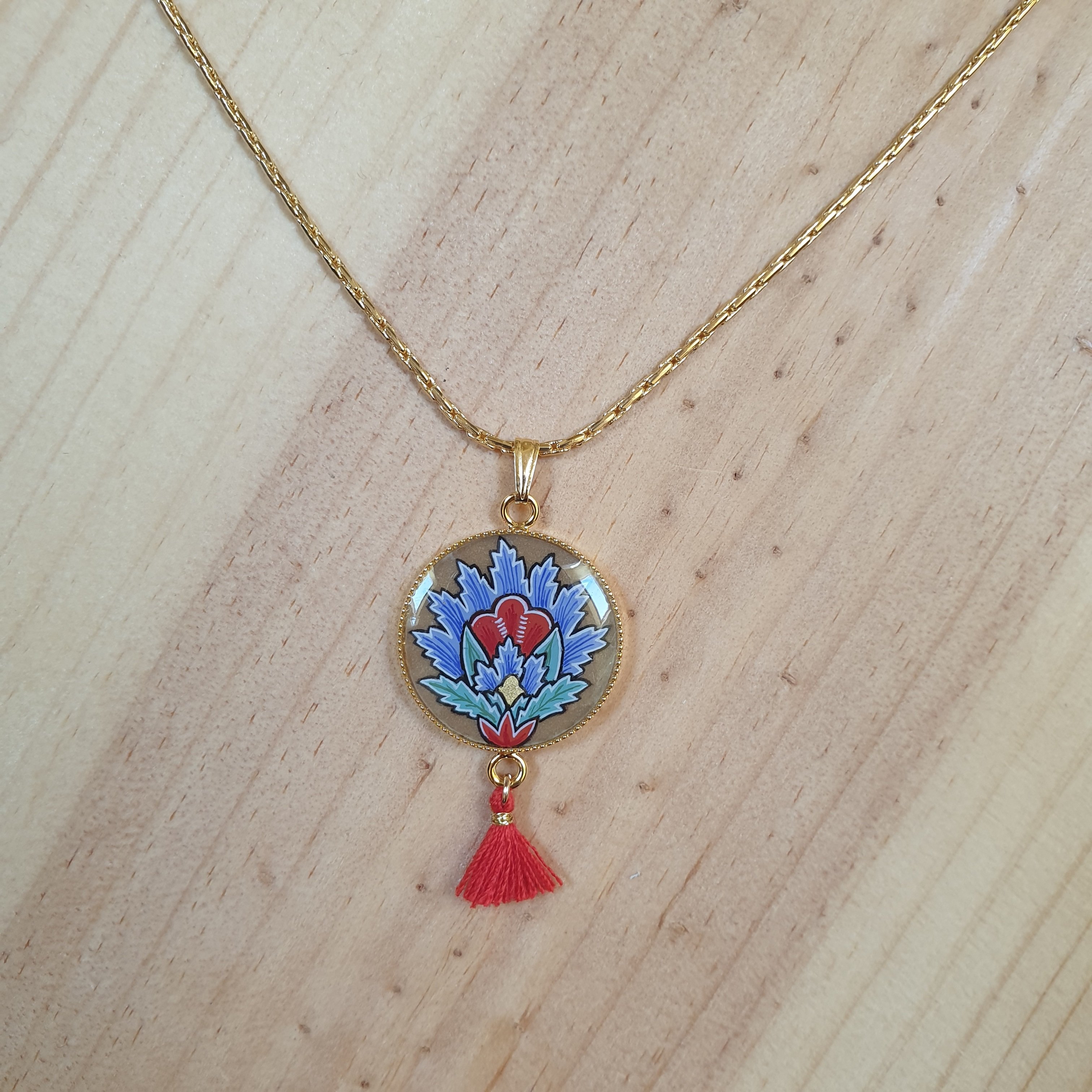 Necklace pendant illuminated blue oriental flower