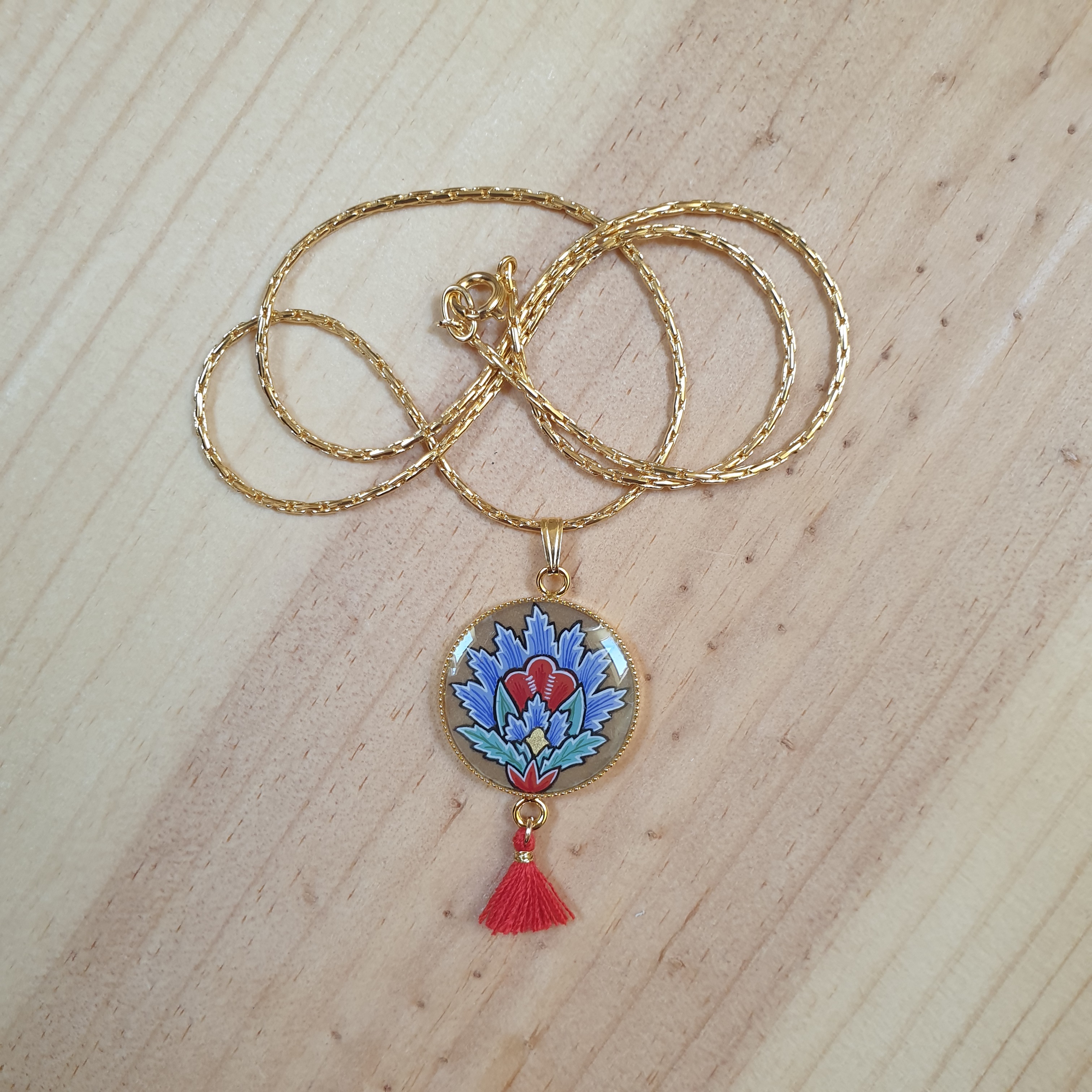 Necklace pendant illuminated blue oriental flower