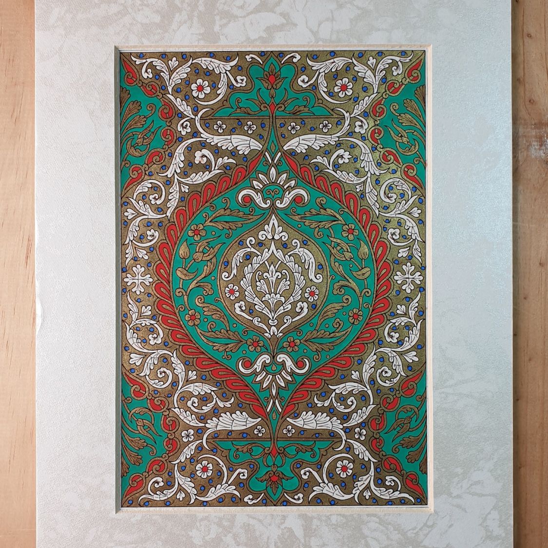 Gold/green/red/blue arabesque illumination