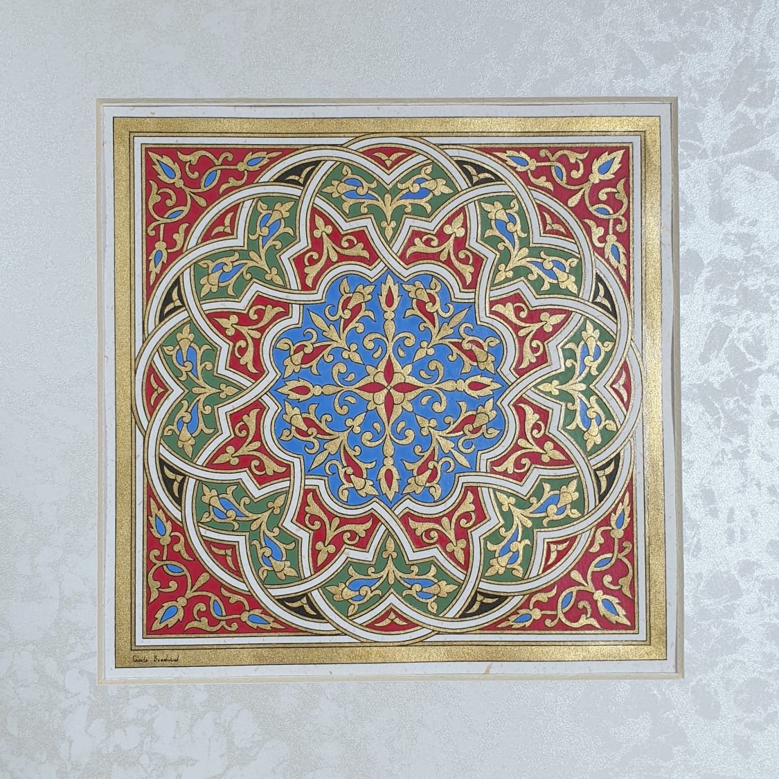 Gold/green/blue/red arabesque illumination 