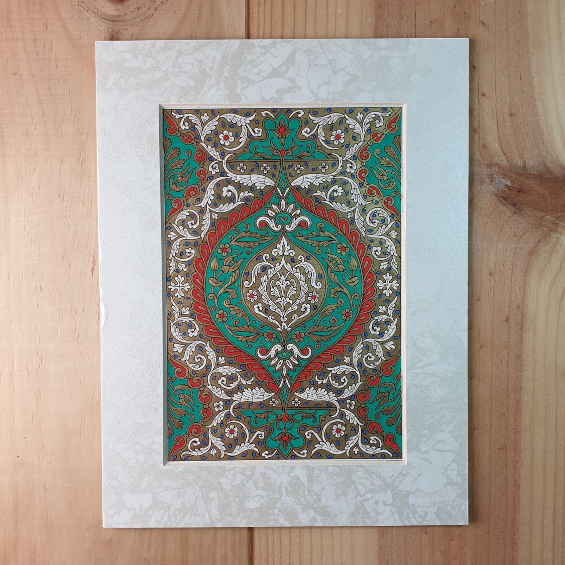 Gold/green/red/blue arabesque illumination