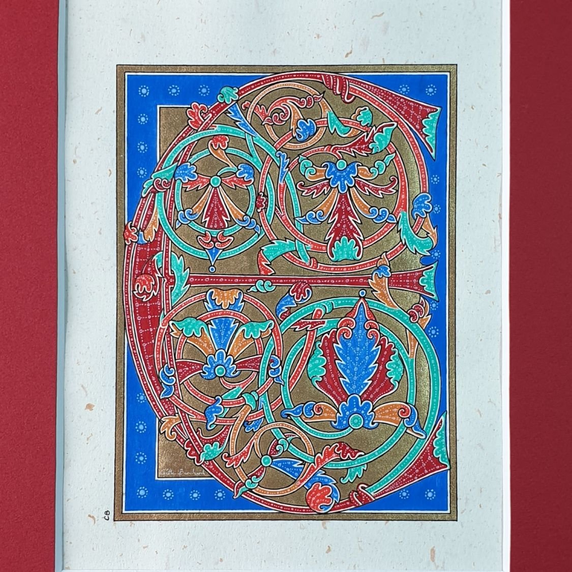 Illuminated letter E in early Gothic style