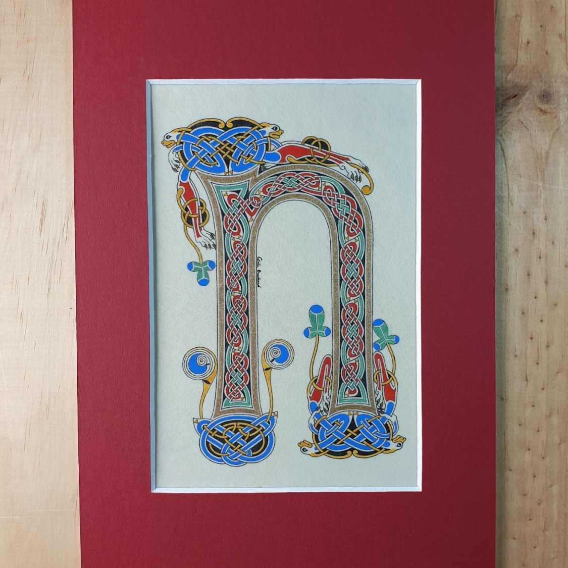 Illuminated letter N island style