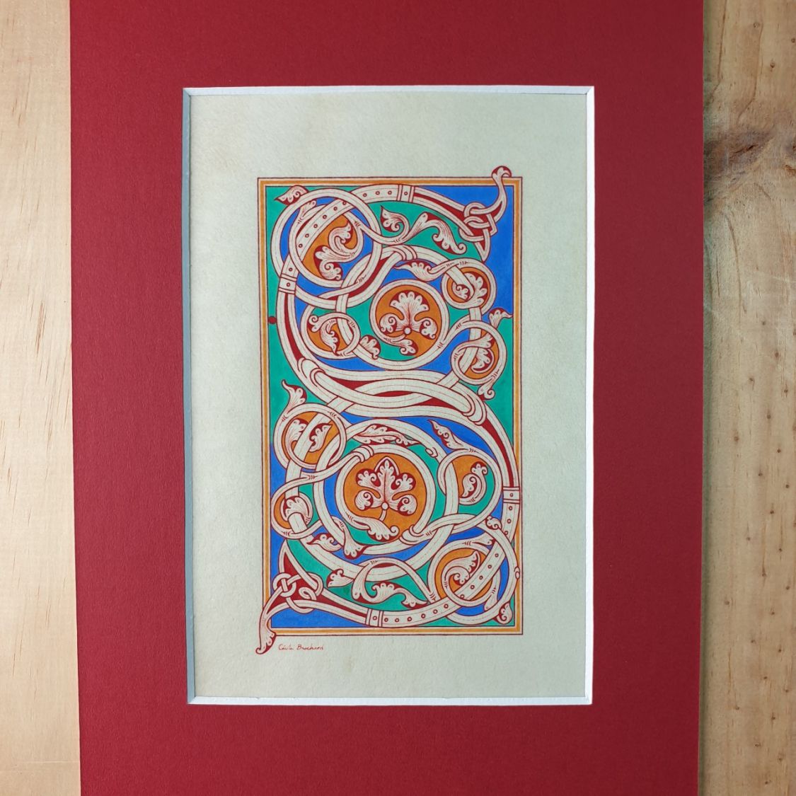 Illuminated letter S in Romanesque style