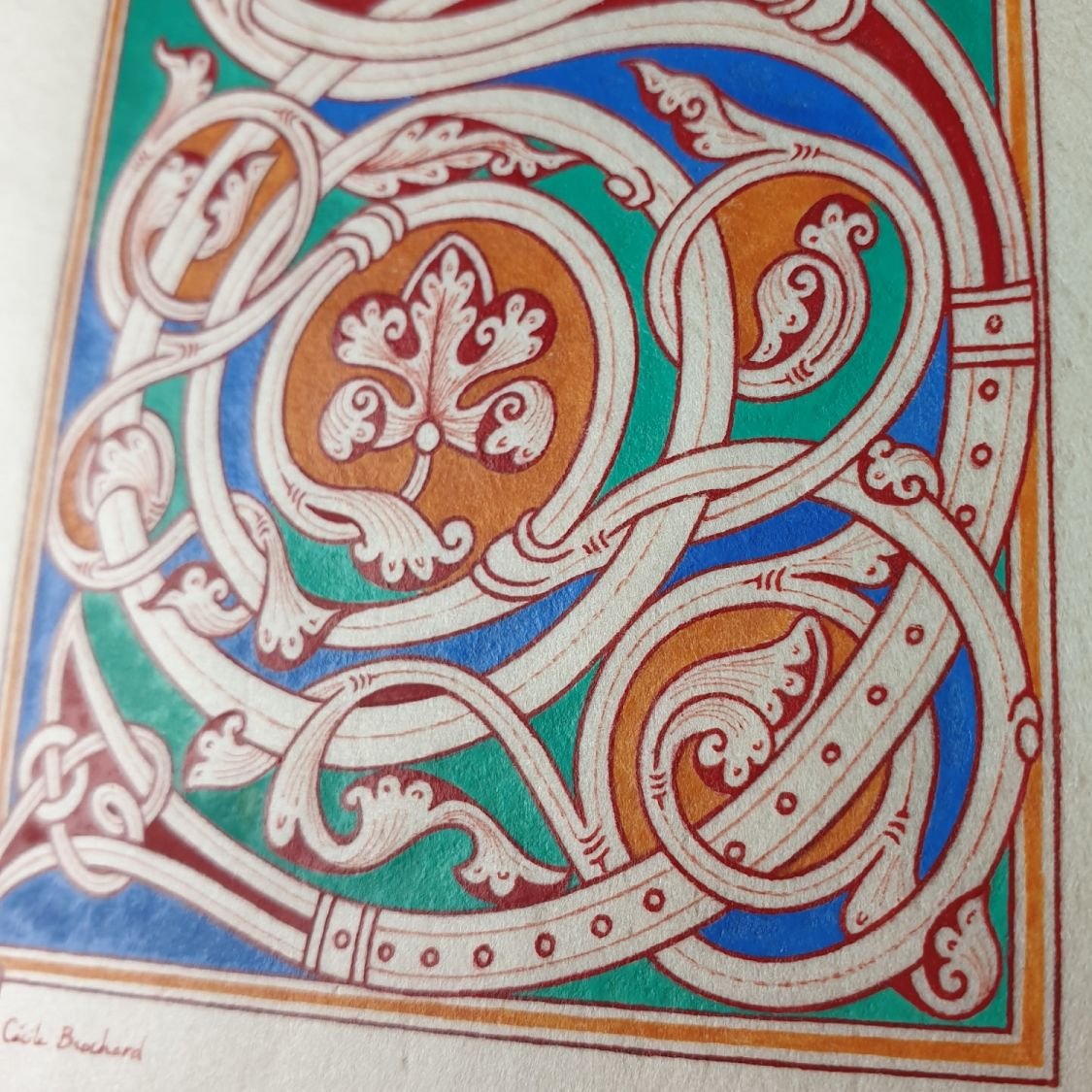 Illuminated letter S in Romanesque style