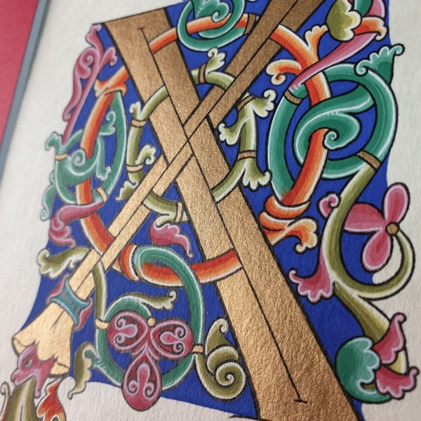 Romanesque illuminated letter X
