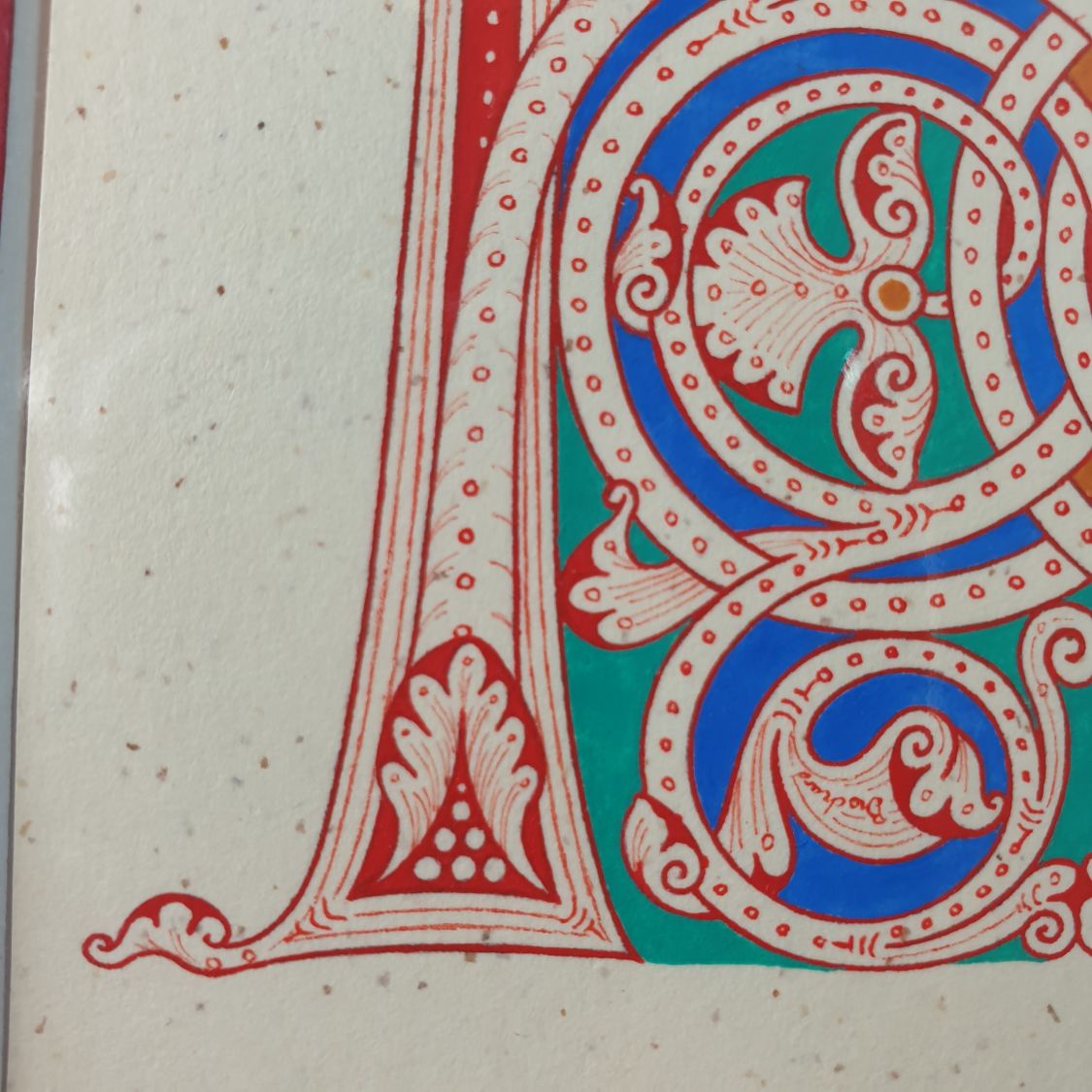 Illuminated letter H in Romanesque style