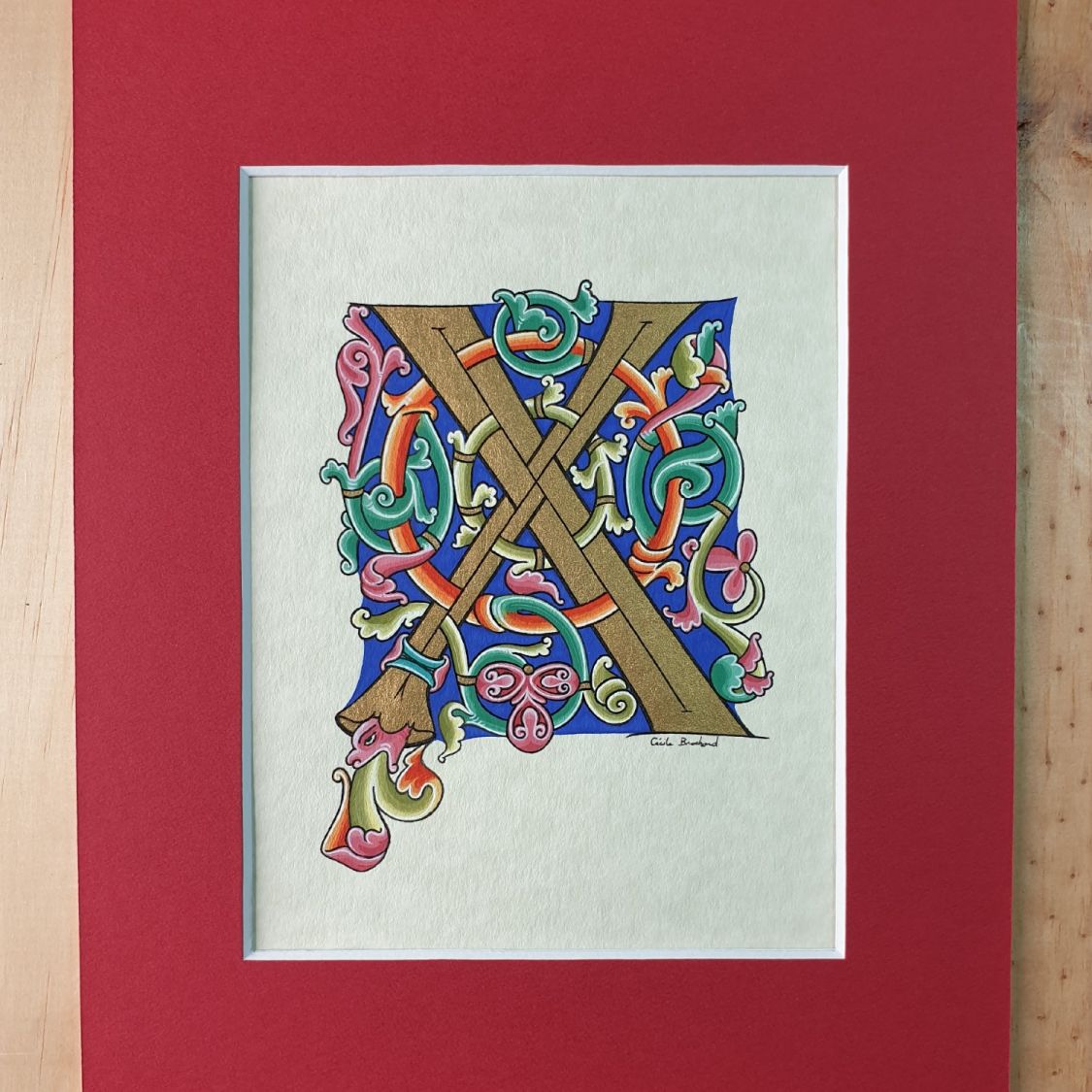 Romanesque illuminated letter X