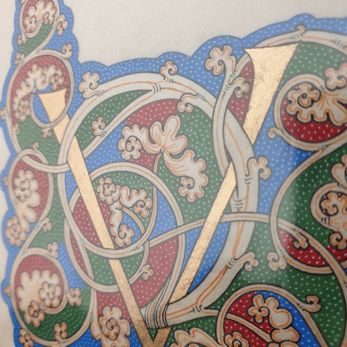 Illuminated letter V "white vine