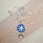 Collier pendentif soleil et lune argent