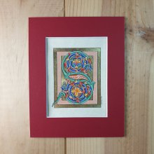 Illuminated letter S in Romanesque style